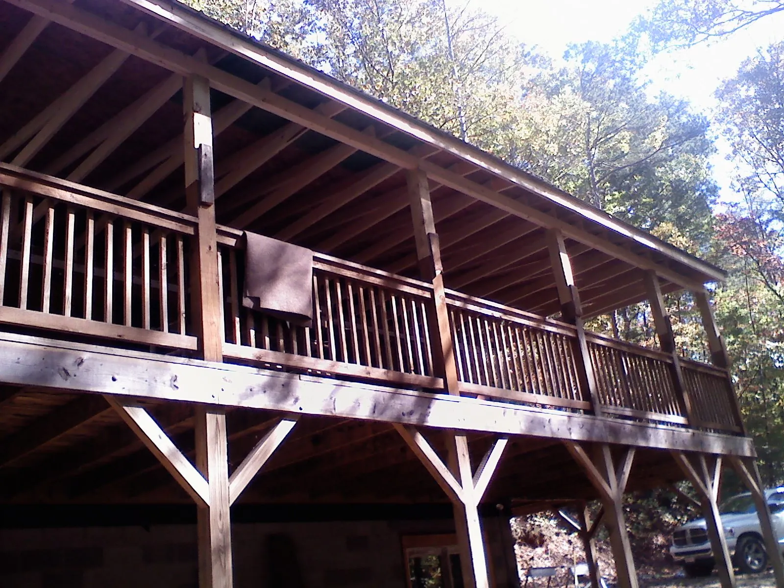 Timber framing under a new elevated porch and deck — Roof Leak Repair in Branch by Roofing Brothers